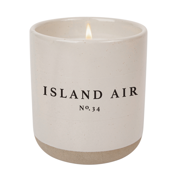 https://www.sweetwaterdecor.com/cdn/shop/products/C034S-ISLAND-AIR-STONEWARE-CANDLE-WB-2023-SWEET-WATER-DECOR_grande.png?v=1680534773